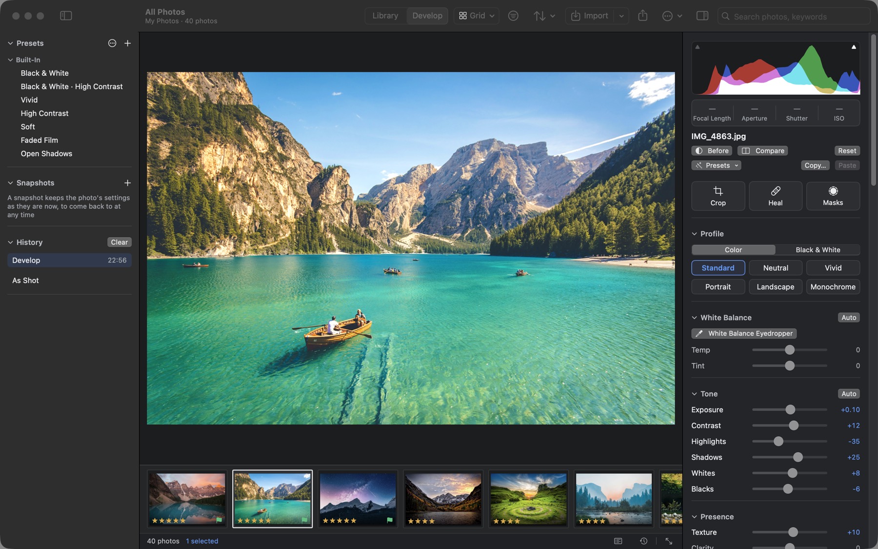The Develop module: a boat on a lake, with the histogram and basic sliders on the right